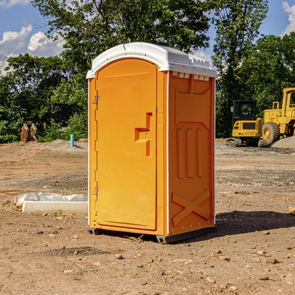 how often are the portable restrooms cleaned and serviced during a rental period in Henry County